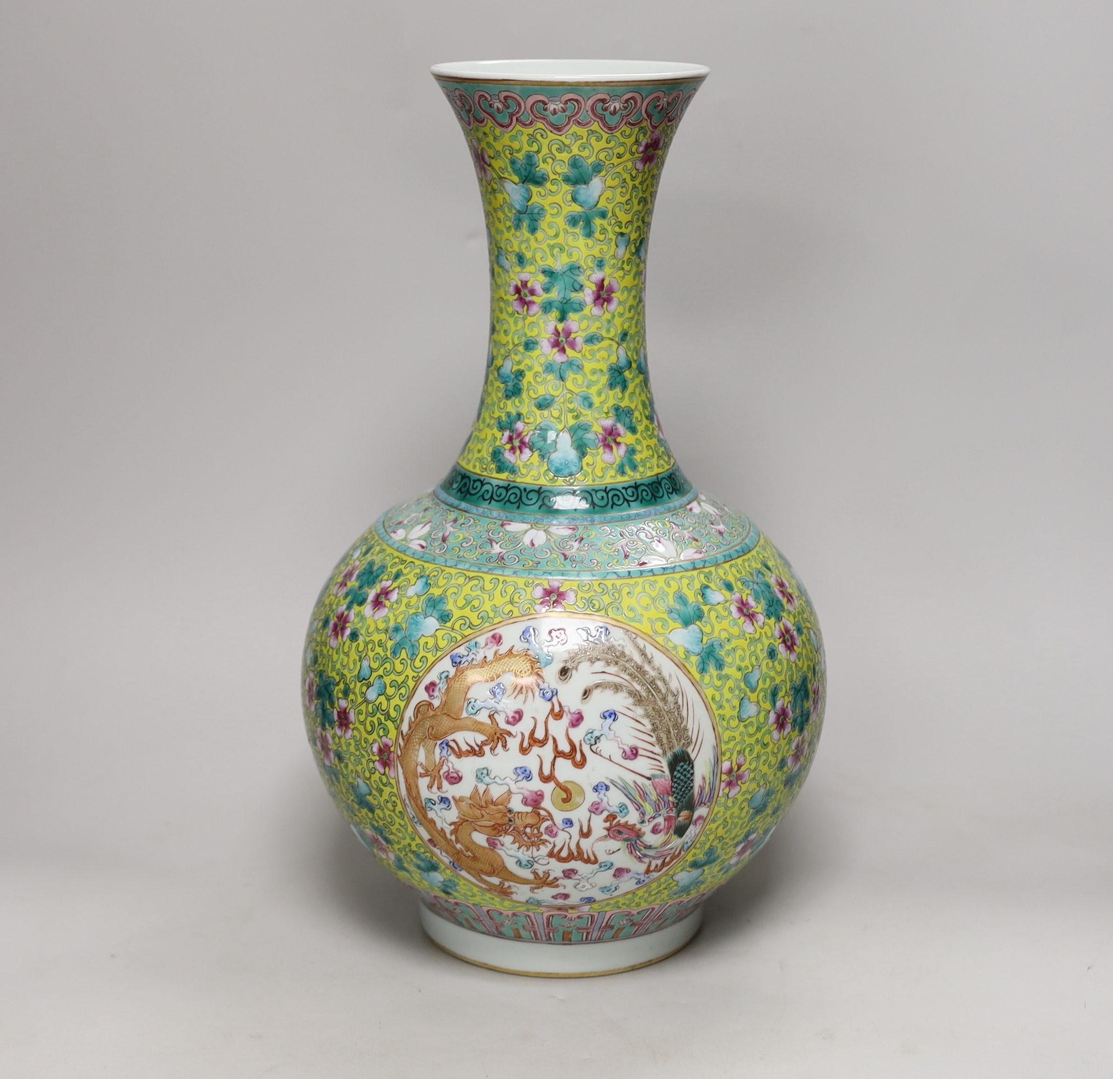 A large Chinese yellow ground ‘dragon & phoenix’ vase, 39cm high